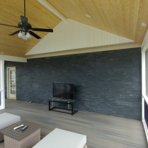 Screened Room with Stone Wall
